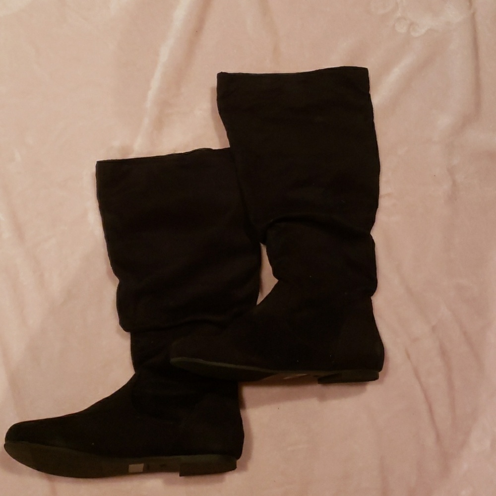 Black slouch boots.